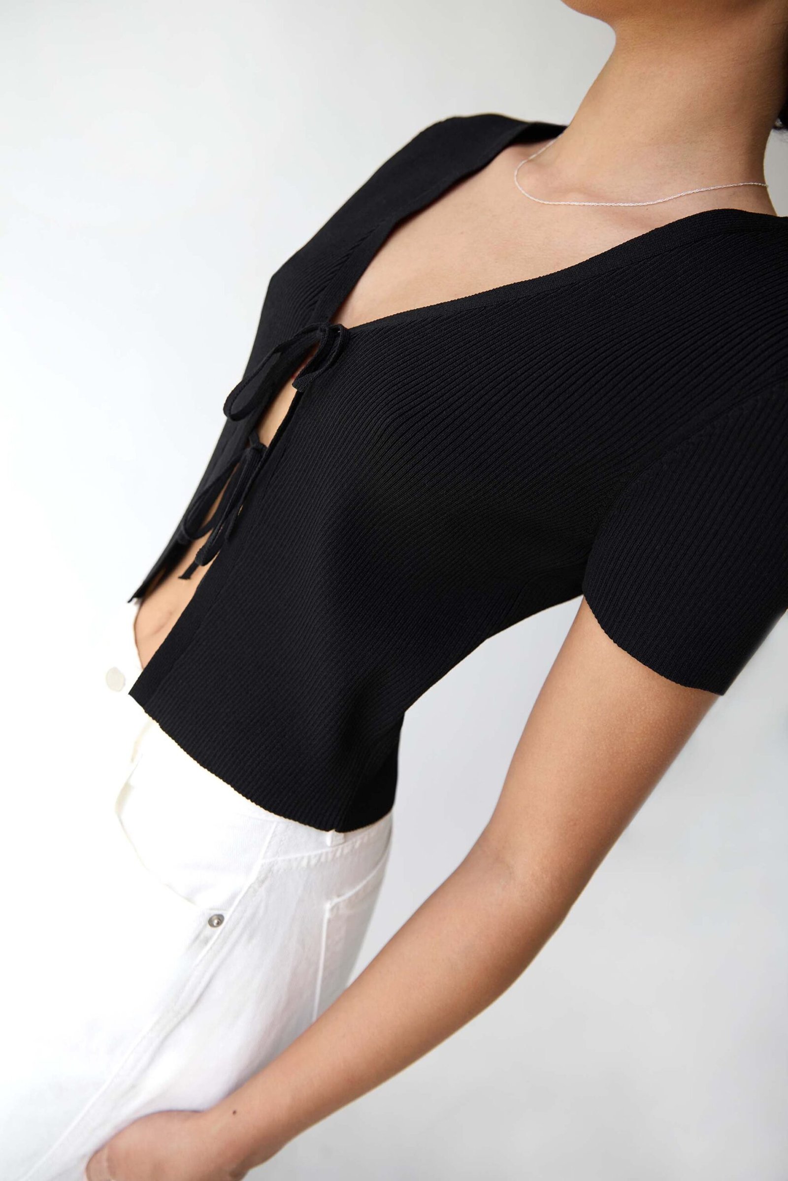 Cardigan-14260_Black-1_f2d0efee-b45a-47f2-84bc-9ad33de7af67.jpg Cropped Short Sleeve Sweater With Open Front Ties - Image 1