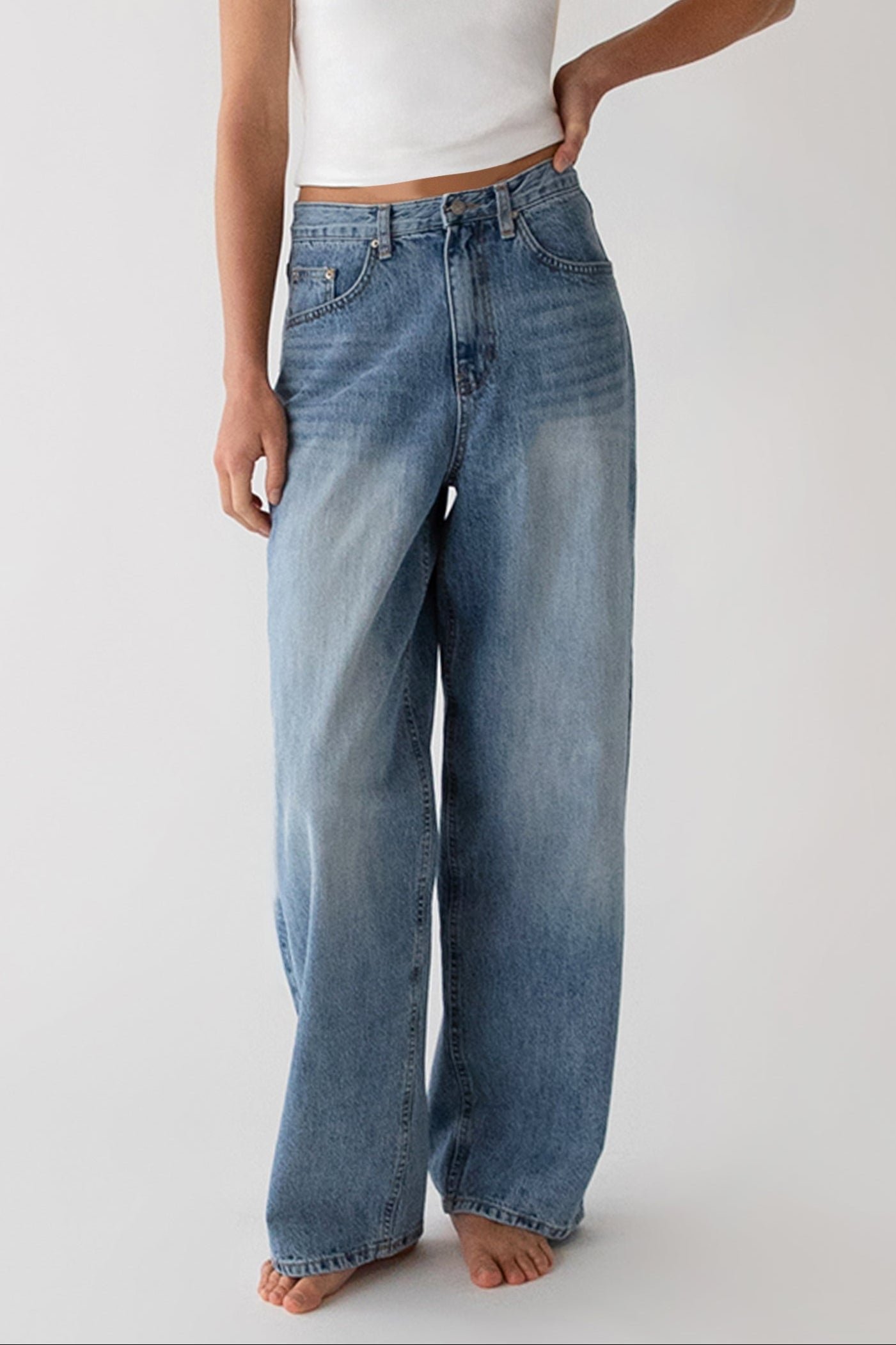 Denim-14903_Light_Wash-1.jpg 28" LENGTH LIGHT WASH CURVED LEG JEAN - Image 1