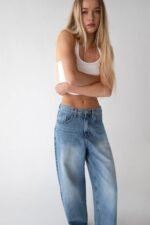 28" LENGTH LIGHT WASH CURVED LEG JEAN - Image 2