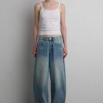 27" CURVE LEG MID RISE DENIM JEAN