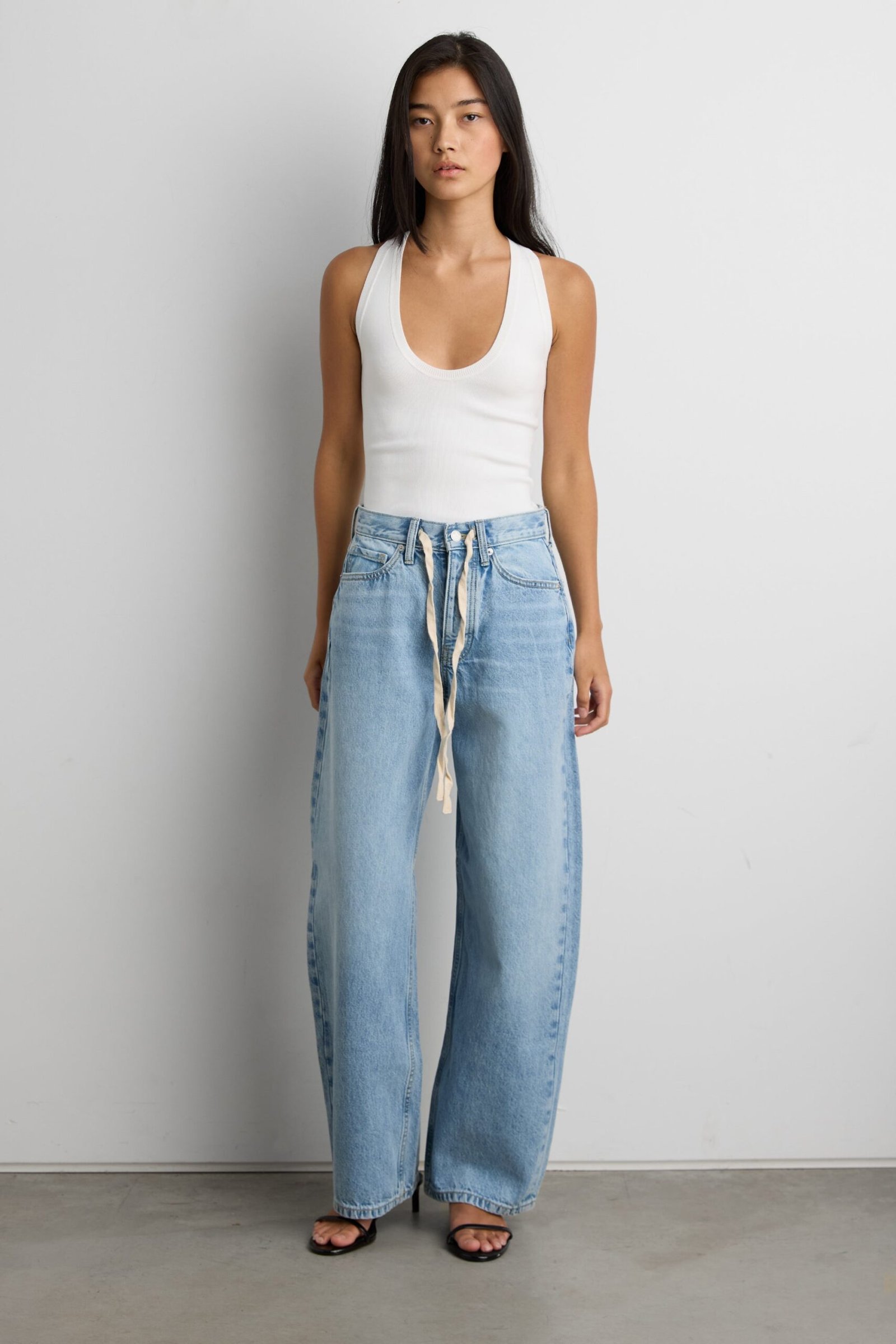 Denim-15648_Light_Stone-1.jpg Mid-Rise Wide Leg Jean With Drawstring Waist - Image 1
