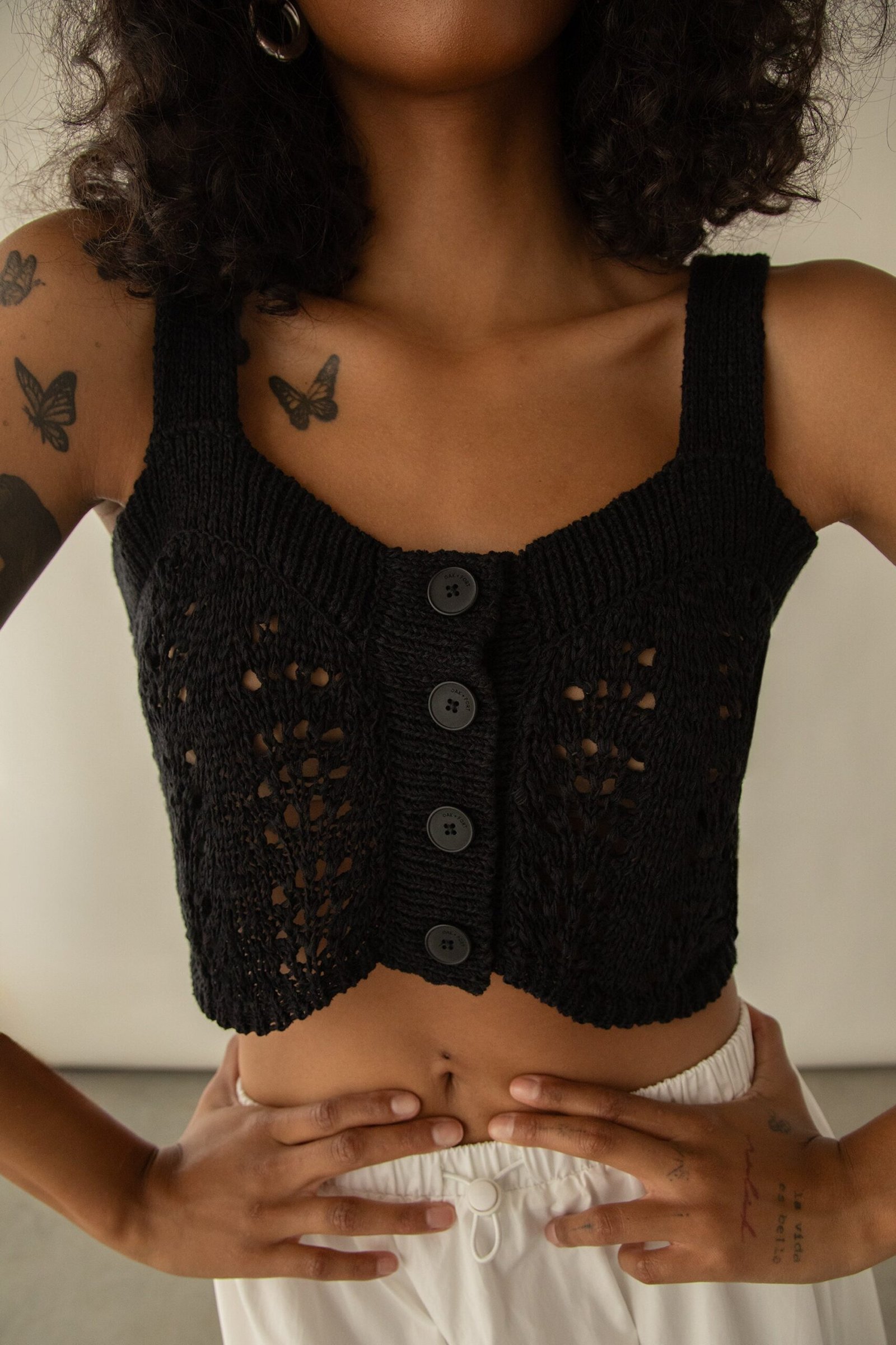 Sweater-12288_Black-1.jpg Cropped Open Knit Tank Top - Image 1